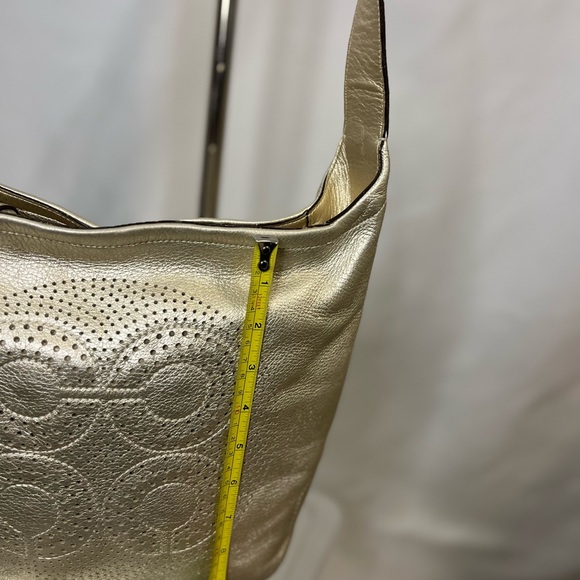 Coach gold crossbody bag.  Adjustable strap. - Picture 3 of 12